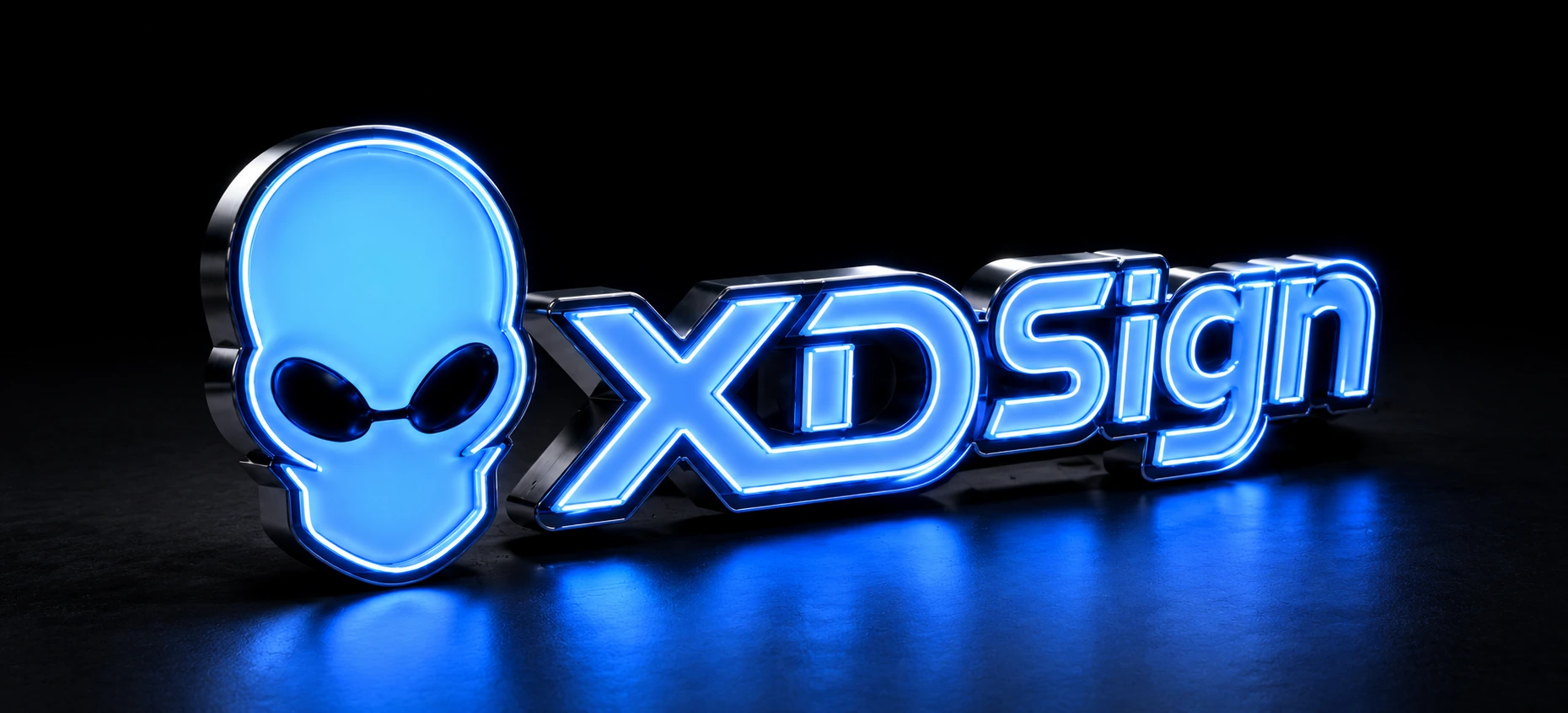 Blue illuminated XDSign dimensional letters and alien logo with chrome edges